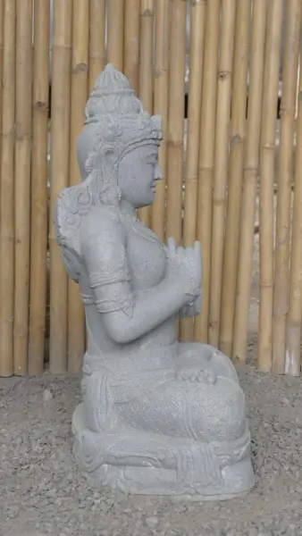 Product image 4 of the product “Seated Dewi Sri, position chakra turning the wheel, 79 cm high riverstone grey, modell with sativa ”